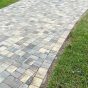 Paver driveway leading to the street apron at a Ponte Vedra, Jacksonville home